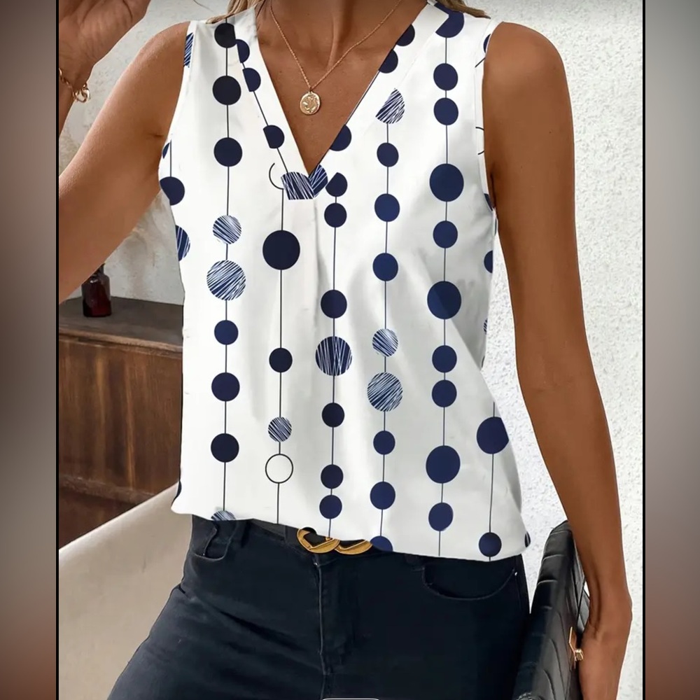 Navy polka dot sleeveless blouse
